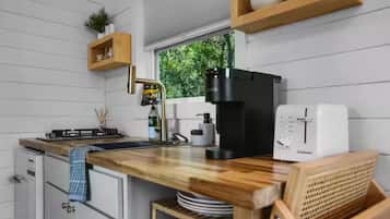 Fridge, stovetop, cookware/dishes/utensils, paper towels