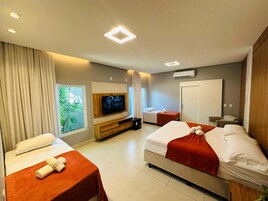 Luxury Triple Room, Garden View | 1 bedroom, desk, laptop workspace, free WiFi