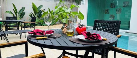 Outdoor pool, open 9:00 AM to 9:00 PM, pool umbrellas, pool loungers