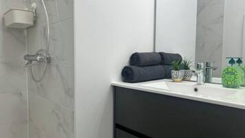 Hair dryer, towels, soap, toilet paper