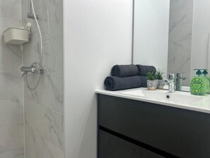 Hair dryer, towels, soap, toilet paper