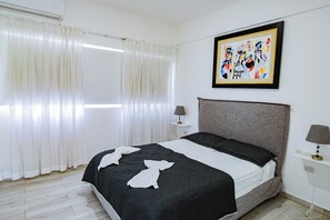 Deluxe Apartment, Balcony, Pool View | 2 bedrooms, blackout drapes, iron/ironing board, free WiFi - Baya Azul Bayahibe - Apto 204 (San Rafael del Yuma)