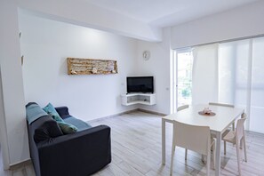 Deluxe Apartment, Balcony, Pool View | Living area - Baya Azul Bayahibe - Apto 204 (San Rafael del Yuma)