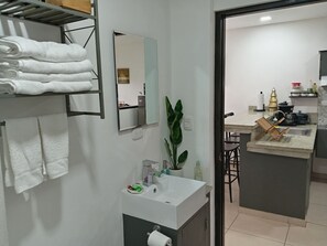 Shower, hair dryer, towels, soap