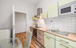 Fridge, stovetop, coffee/tea maker