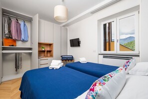 2 Schlafzimmer, BĂŒgeleisen/BĂŒgelbrett, WLAN, BettwĂ€sche