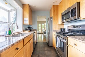Fridge, microwave, oven, stovetop - Charming & Spacious Lakewood Retreat Near Local Attractions (Seattle)