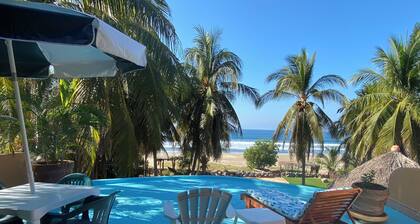 Casa Pelicanos is a private beachfront home with pool. Short walk to town.