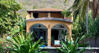 Casa Pelicanos is a private beachfront home with pool. Short walk to town.