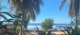 Casa Pelicanos is a private beachfront home with pool. Short walk to town.
