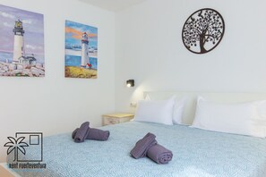 1 bedroom, desk, iron/ironing board, travel cot - Casa La Rosa Papagayo Corralejo iRentFuerteventura (Corralejo)