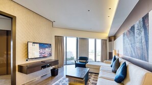 Family Room | Living area | 65-inch LCD TV with satellite channels, streaming services