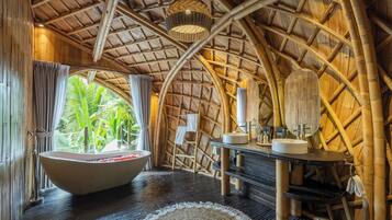 Moon Villa | Bathroom | Separate tub and shower, towels, soap, shampoo