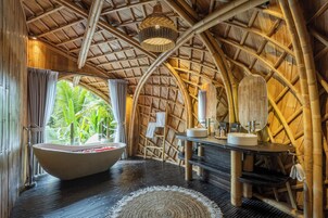 Moon Villa | Bathroom | Separate tub and shower, towels, soap, shampoo
