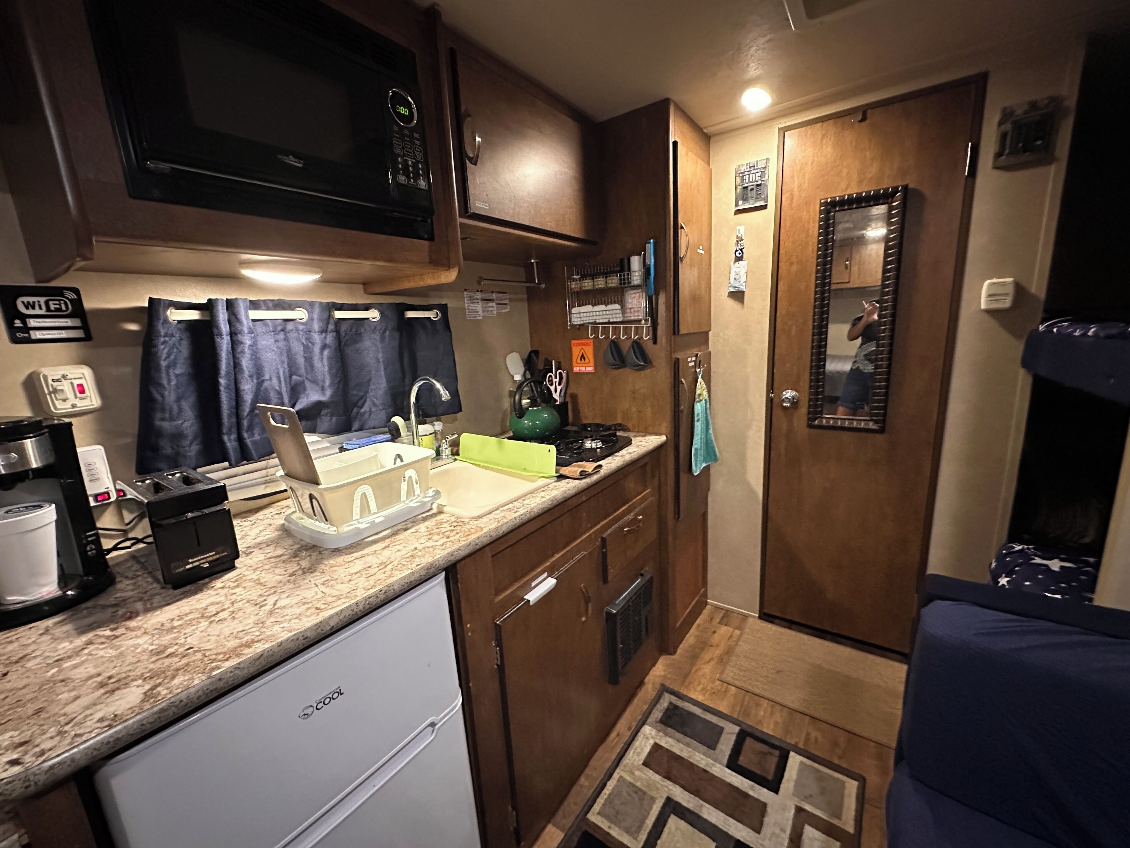 Fridge, microwave, stovetop, coffee/tea maker