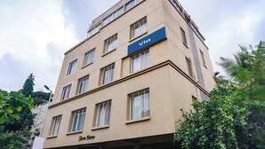 A multi-story building with a sign reading 'Via' and 'Shree Harek' on the facade. - Fabhotel Shree Haree Residency (Pune)
