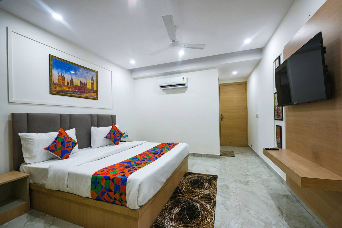 Deluxe kamer | Lakens van Egyptisch katoen, luxe beddengoed, een kluis op de kamer
