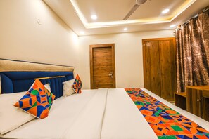 Deluxe Room | Egyptian cotton sheets, premium bedding, in-room safe, free WiFi - Fabhotel The Grand Velvet (Noida)