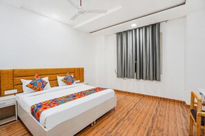 Deluxe kamer | Lakens van Egyptisch katoen, luxe beddengoed, een kluis op de kamer