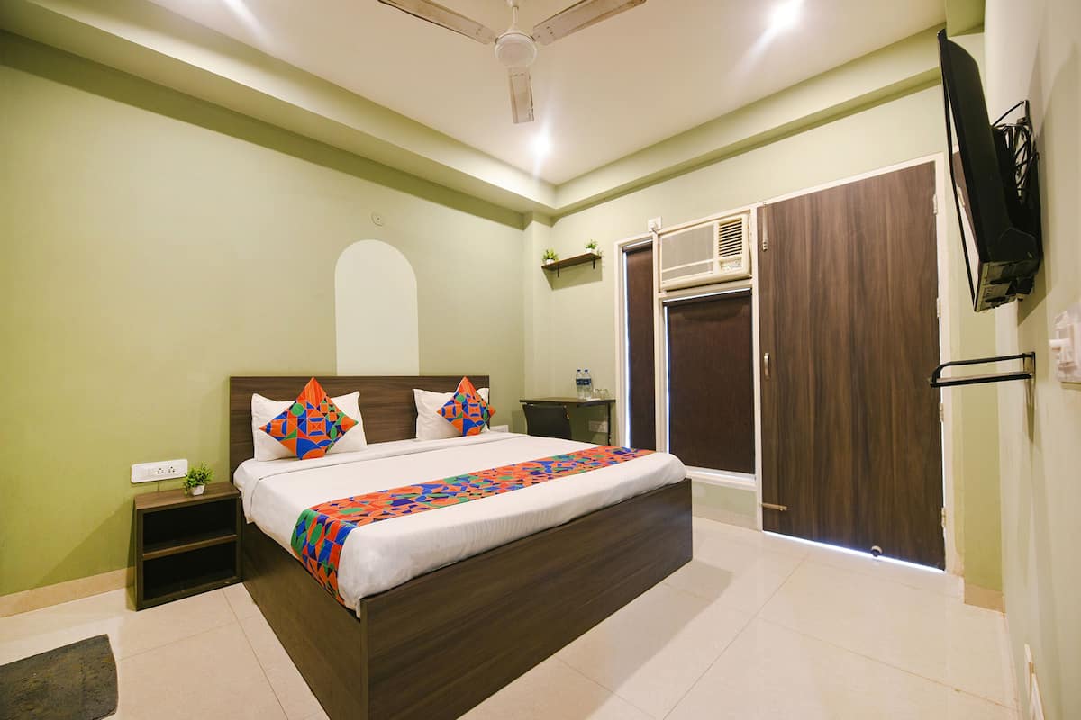 Deluxe kamer | Lakens van Egyptisch katoen, luxe beddengoed, een kluis op de kamer