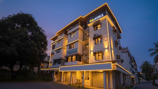 A multi-story hotel with a modern design, featuring balconies and a prominent 'fabHOTELS' sign. - Fabhotel Comfort Stays (Panaji)