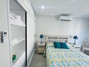 2 dormitorios, tabla de planchar con plancha, wifi gratis y ropa de cama