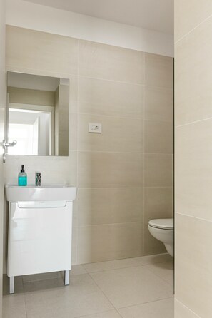 Hair dryer, towels, soap, shampoo
