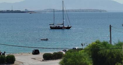 Classy 1-bedroom condo; WiFi, AC, home-office, playroom, sea view at Salamina