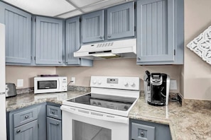 Fridge, microwave, oven, stovetop - Oceanfront Resort Retreat with Ocean Views (North Topsail Beach)