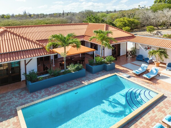 Outdoor pool, open 8:00 AM to 9:00 PM, pool umbrellas, pool loungers