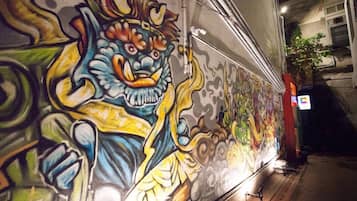 A colorful mural on a building's exterior wall.