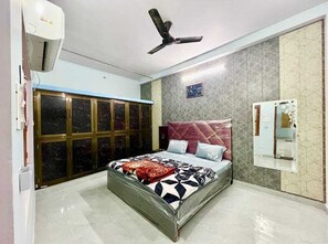 Family Room | Premium bedding, pillowtop beds, soundproofing, free WiFi - Trilok Residency  (Varanasi)