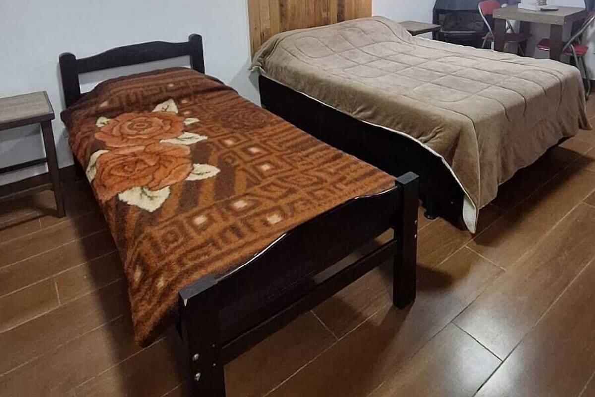 Chambre triple Deluxe, balcon, vue sur la montagne | AccĂšs au Wi-Fi (inclus)