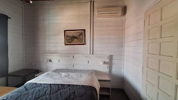 Deluxe Quadruple Room, Balcony | Premium bedding, pillowtop beds, individually decorated