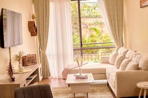 Living area - Sand Grains Residences - 004 (Bwebajja Dundu)