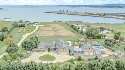 Petite Chateau Waterfront chateau with Hot Tub