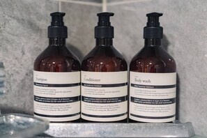 Hair dryer, towels, soap, toilet paper