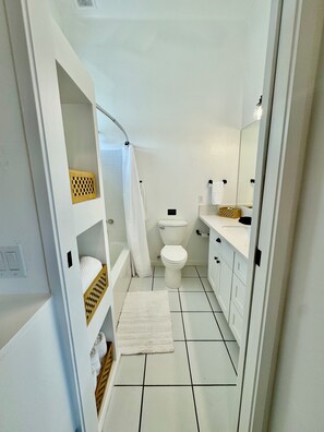 Hair dryer, towels, soap, shampoo