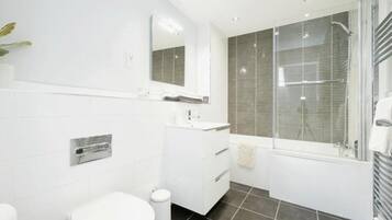Hair dryer, towels, soap, toilet paper