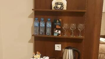 Deluxe Triple Room, City View | In-room safe, desk, soundproofing, free WiFi