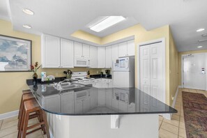 Coffee/tea maker, fridge, microwave, oven