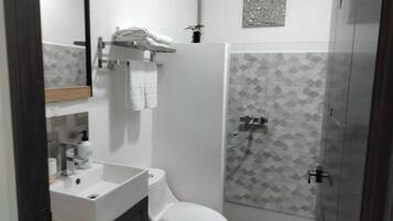 Shower, hair dryer, towels, soap