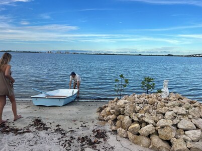 Waterfront luxury bungalow with private beach, paddleboards, kayaks and bikes!