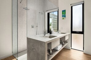 Shower, hair dryer, towels, soap