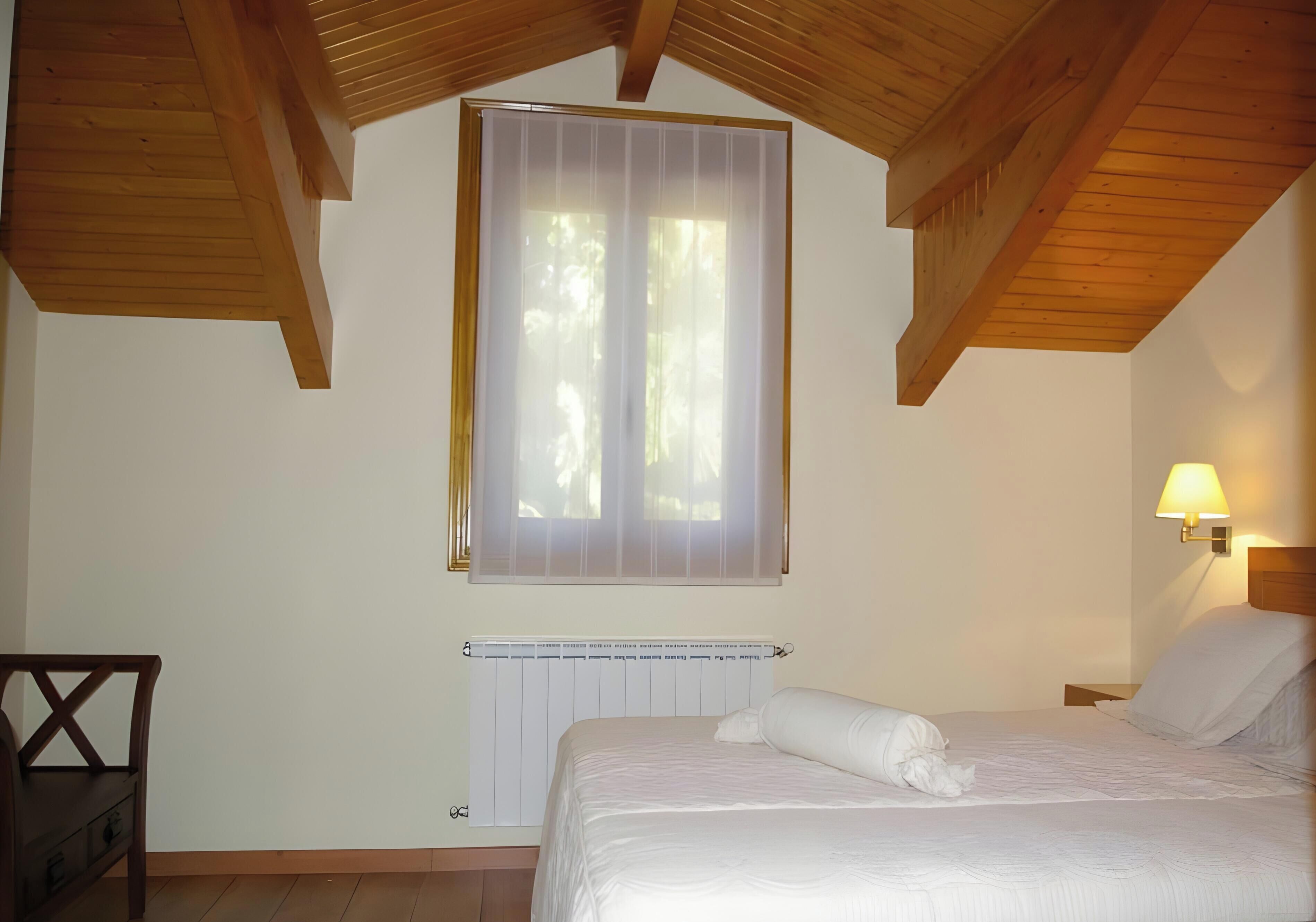 2 dormitorios, tabla de planchar con plancha, wifi gratis y ropa de cama