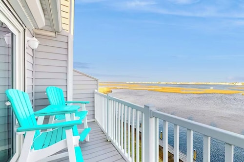 Relax at Bay Breeze, a fully equipped 3BR oasis, just a mile to amazing beaches!