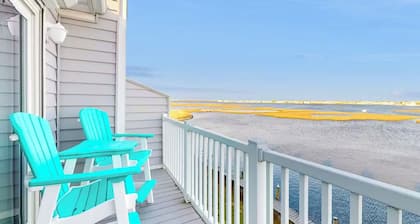 Relax at Bay Breeze, a fully equipped 3BR oasis, just a mile to amazing beaches!