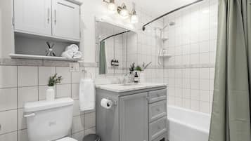 Hair dryer, towels, soap, shampoo