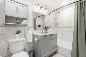 Hair dryer, towels, soap, shampoo