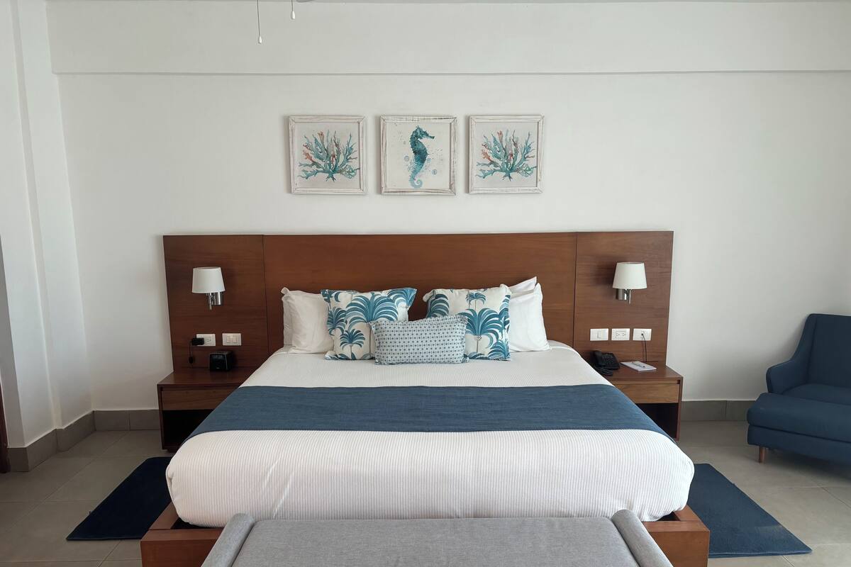 Double Room, Patio, Garden View | In-room safe, iron/ironing board, WiFi (free), bed sheets